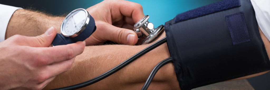 person getting their blood pressure checked