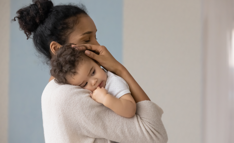 Woman holding infant